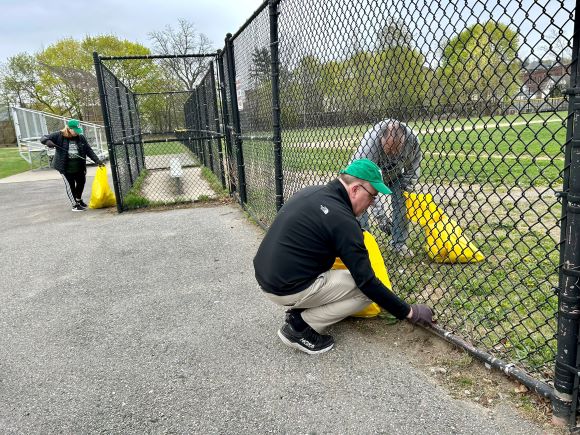 Jim picking up trash